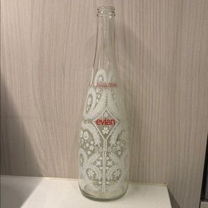 Christian Lacroix Clear Glass Bottle with White Lace Design and Red Logo